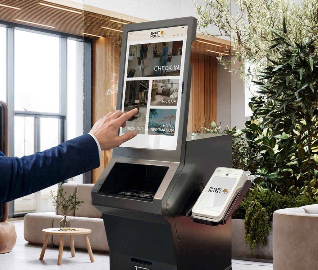 Guest using a hotel self-service check-in kiosk
